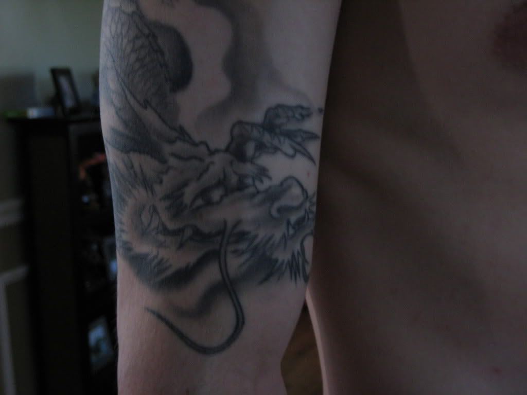 dragon face tattoo